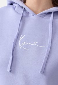 Karl Kani Jersey con capucha - lilac