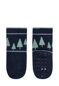 Dunkelblaue Socken mit grünen Baummustern, die über eine gerippte Textur und rutschfeste Gummigriffe an der Sohle für besseren Halt verfügen.