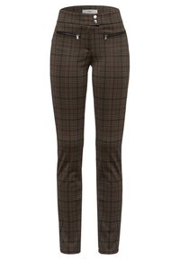 Rutig byxor i nyanser av grönt och brunt med en figurnära silhuett, dragkedjefickor och två framknappar. Strukturerad tyg med ett rutigt mönster.