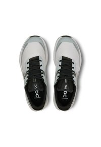 Cloudvista athletic shoes with a white mesh upper, light blue accents, black laces, and a cushioned black interior.