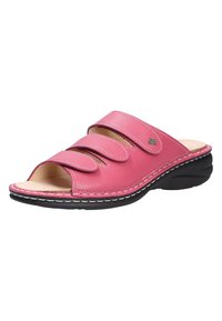 Pink leather slide sandal with three adjustable straps, open-toe design, cushioned insole, and contrasting black rubber outsole.
