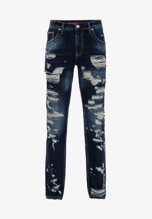 Dunkelblaue Denim-Jeans mit schmaler Passform, die beschädigte Stellen und ausgefranste Kanten aufweisen. Standard-Fünf-Taschen-Design mit Metallbesatz.