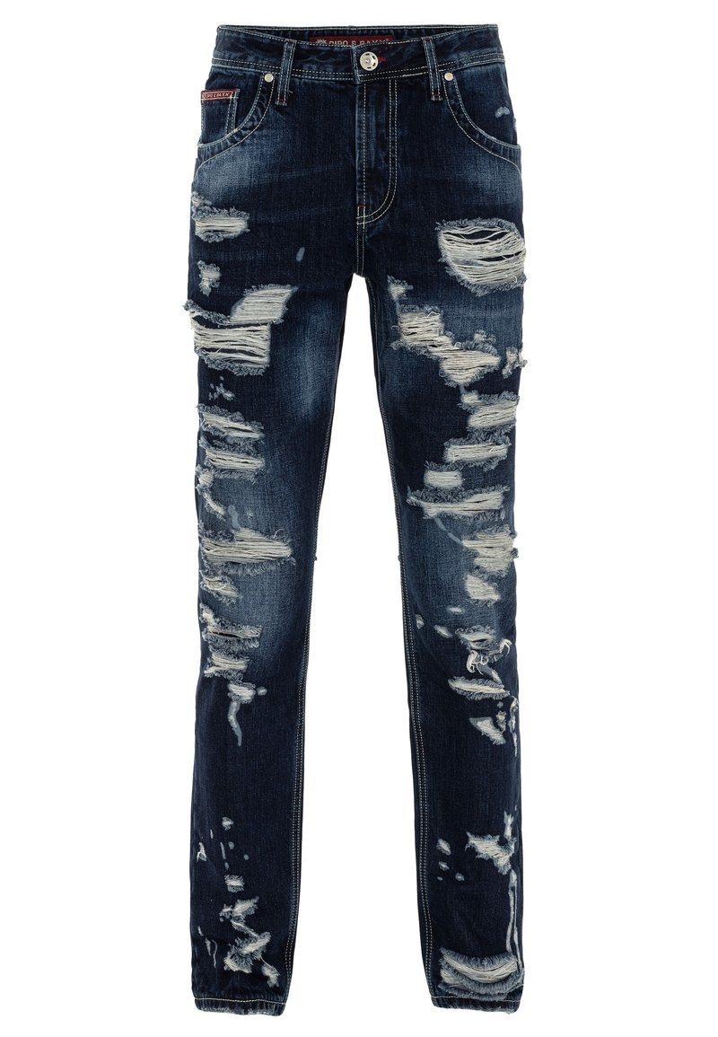 Dunkelblaue Denim-Jeans mit schmaler Passform, die beschädigte Stellen und ausgefranste Kanten aufweisen. Standard-Fünf-Taschen-Design mit Metallbesatz.