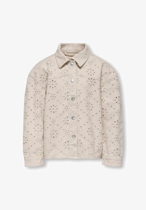 Bež jakna s kragnom, s izvezenim cvjetnim uzorcima i izrezima. Prednje kopčanje na gumbe i duži rukavi.