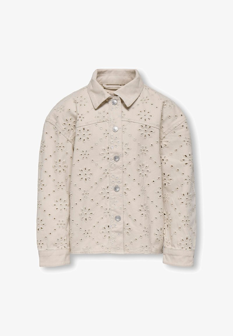 Šviesiai ruda striukė su apykakle, dekoruota siuvinėtais gėlių raštais ir išpjovomis. Priekyje užsegama mygtukais, ilgomis rankovėmis.