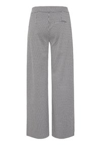 Pantalon large taille haute pied-de-poule noir et blanc, avec poches passepoilées au dos et taille ajustée.