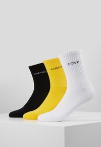 Urban Classics - WORDING SOCKS 3 PACK - Socks - black/white/yellow Thumbnail Image 1