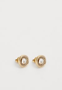 Boucles d'oreilles en or avec un design circulaire, mettant en vedette un cristal clair central entouré de petits cristaux en sertissage griffé.