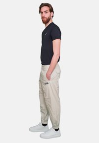 Armani Exchange Pantaloni - bia  latte