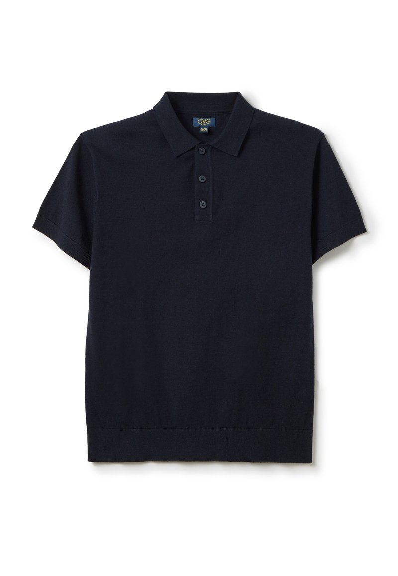 Marineblauwe polo met korte mouwen, gemaakt van zachte katoen, met een klassieke kraag, een drieknoopsluiting en een geribde zoom.