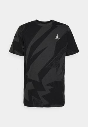 Zwart en donkergrijs abstract patroon korte mouw T-shirt met een klein wit Jumpman-logo op de linkerborst.