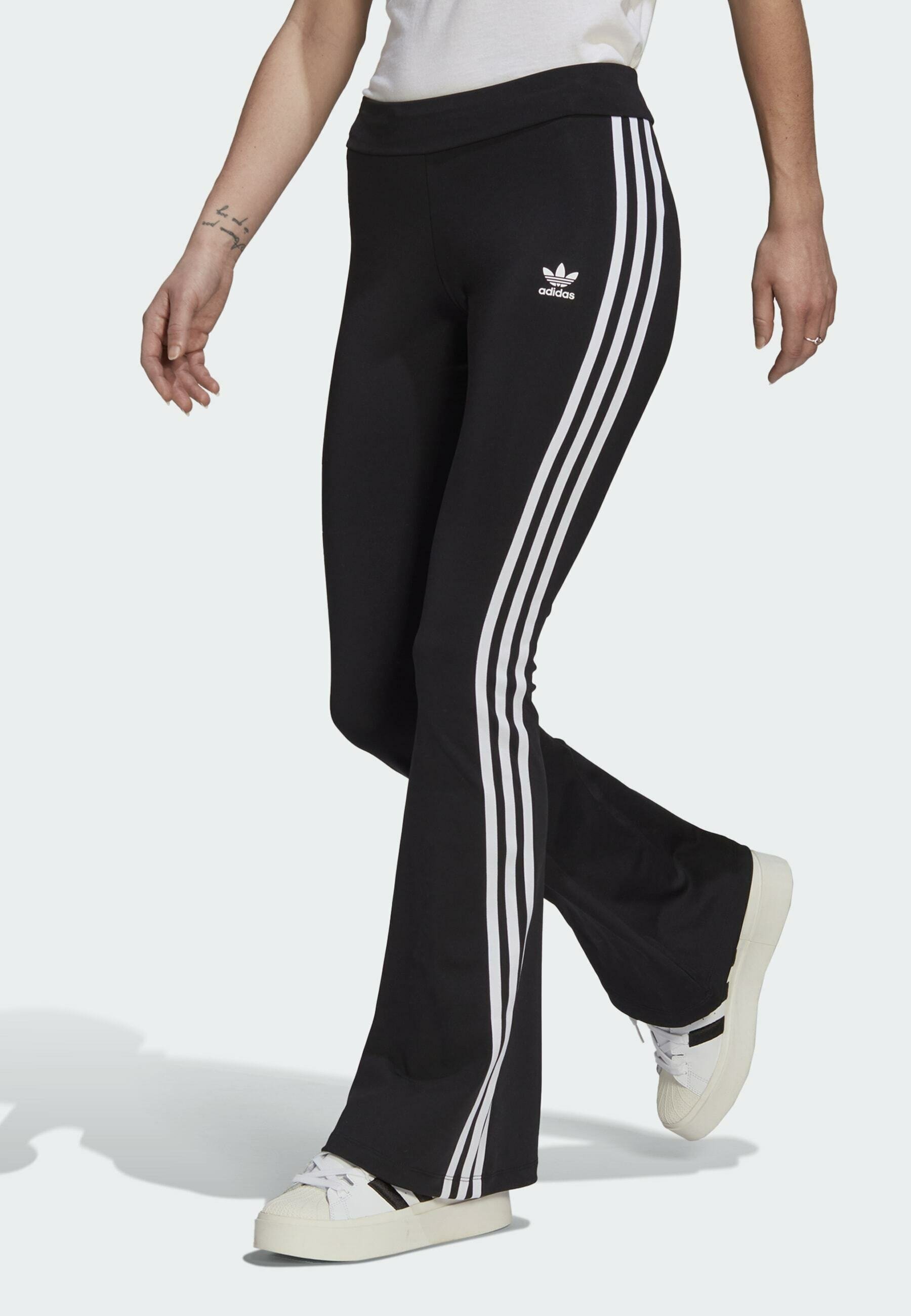 adidas Originals FLARED PANTS - Leggings Trousers - black - Zalando.co.uk