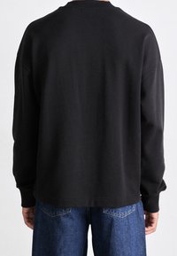 HUGO Sudadera - black