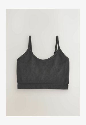 Mustast ribamustrilisest materjalist rinnahoidja, millel on õhukesed reguleeritavad rihmad, ümar kaelus ja sile tekstuur, ilma nähtava õmbluseta alaosas.