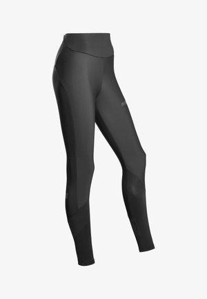 Schwarze Leggings aus elastischem Stoff mit einem hohen Bund, strukturierten seitlichen Einsätzen und schlankem, figurbetontem Design.