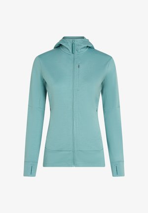 Un sweat à capuche zippé bleu clair à manches longues avec des trous pour les pouces aux poignets et des poches zippées sur la poitrine et sur les côtés, présenté sur un fond blanc.