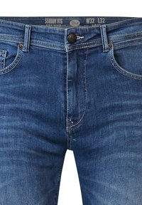 Blå denimjeans med slim fit, storlek W32 L32, med en klassisk knapp, femfickorsdesign och subtil blekning i tyget.