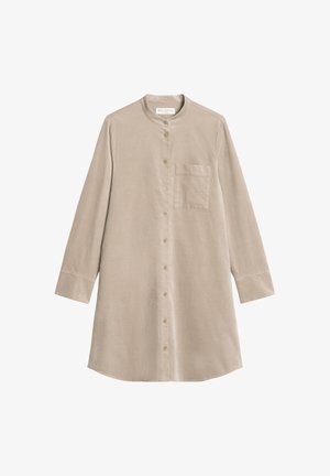 Beige overhemd met lange mouwen en knoopsluiting, met een staande kraag, een enkele borstzak en een relaxte pasvorm. Gemaakt van lichte, structuurstof.