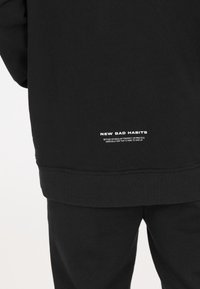 Les'Arcs Kapuzenpullover - zwart