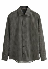 Chemise noire à manches longues avec un motif géométrique en cercles blancs et dorés. Dispose d'un col classique et d'une fermeture à boutons.