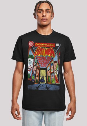 Black t-shirt featuring a colorful graphic print of Batman with comic-style illustrations of villains and bold text on the front.