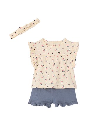 Cream short-sleeve top with cherry print and ruffled sleeves, paired with blue ruffled shorts and a matching cream cherry-print headband.