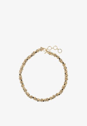 Bracelet en ton or avec des perles circulaires alternées ornées d'accents en cristal et en pierre noire, fermé par un fermoir mousqueton avec extension.