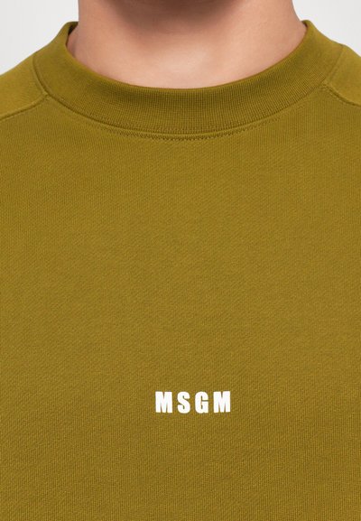 Olivovo zelená bavlnená mikina s okrúhlym výstrihom a rebrovaným golierom. Na hrudi je tlačené biele logo "MSGM". Mäkká textúra, ležérny dizajn.