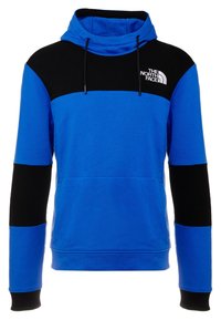 Modrá mikina s kapucí a černými akcenty, vybavená přední kapsou, regulovatelnou kapucí se šňůrkou a logem na prsou. Vyrobena z měkké tkaniny.