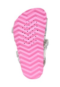 Zapato infantil con una suela de patrón en zigzag. La suela exterior es de goma rosa, con agujeros de ventilación y el logotipo en relieve de "GEOX".