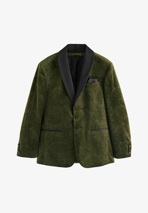 Tamsiai žalias aksominis švarkas su juodu satino šālų apykakle, subtiliu gėlių raštu, su vienu sagos užsegimu ir priekinėmis bei krūtinės kišenėmis.