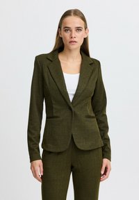 Olivgrüner Herringbone-Blazer, taillierter Schnitt, Ein-Knopf-Verschluss, zwei Fronttaschen, Reverskragen, strukturierter Stoff.