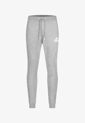Pantalon de jogging gris clair avec taille élastique, cordon de serrage, poignets côtelés et petit logo blanc Lonsdale London sur la cuisse gauche.