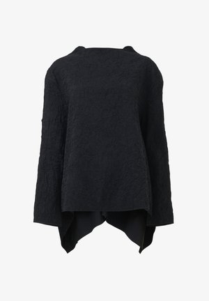 Black blouse with crinkled texture, wide sleeves, and an asymmetric hem. Lightweight fabric enhances flow and drape. No visible fastenings.