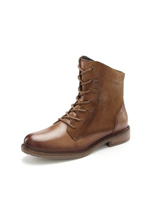 Brown leather ankle boots with a smooth finish, round toe, lace-up front, and textured suede panels. Stacked heel and rubber sole.