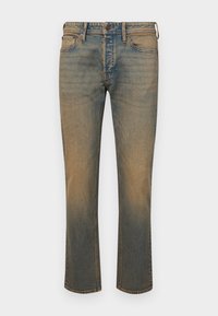 Falmede blå jeans med rett snitt, som har fem lommer, kontraststing og en litt lysere vask ved kanten.