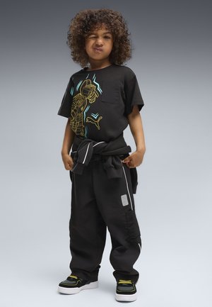 Puma, PUMA X TRANSFORMERS RELAXED GRAPHIC T-SHIRT - T-shirt print - black