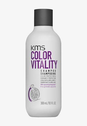 Flacon de shampooing blanc étiqueté KMS Color Vitality avec bouchon noir, avec illustration de grenade et texte indiquant un volume de 300 ml.