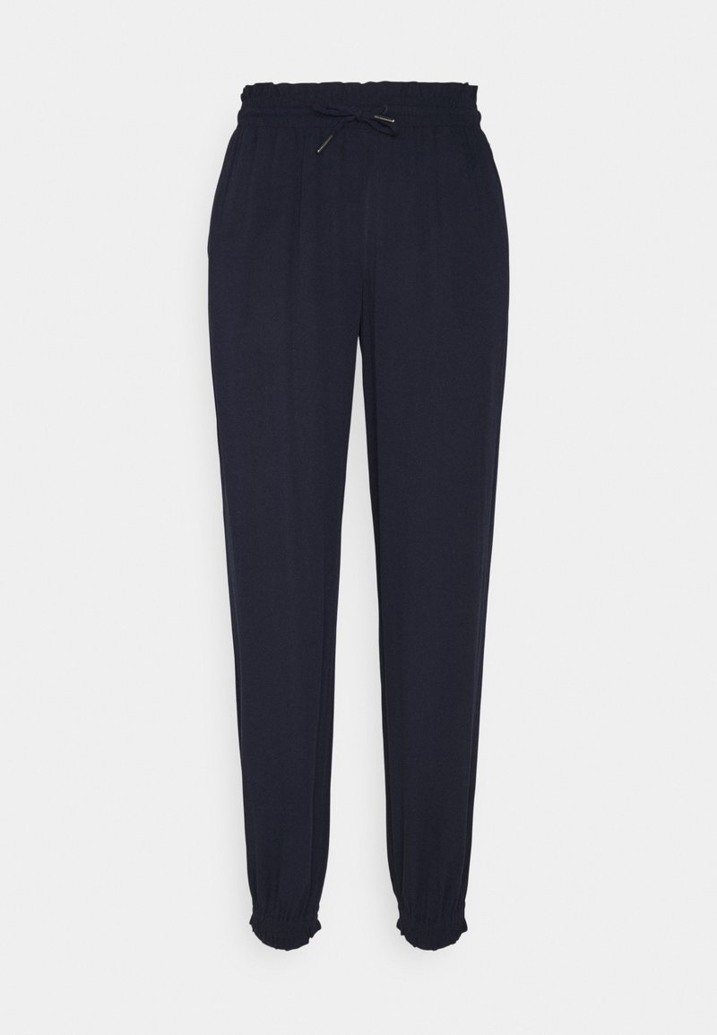 Pantalon de jogging bleu marine avec taille élastique et cordon de serrage, poignets élastiques aux chevilles, poches avant, style décontracté.