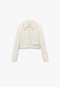 Geknipte witte jas van gestructureerde stof, met een ruitpatroon, kraag, knoopsluiting en twee voorzakken. Op maat gemaakt ontwerp.