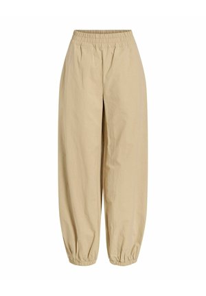 Pantaloni casual bej cu talie elastică și manșete la glezne, croială lejeră, material ușor.