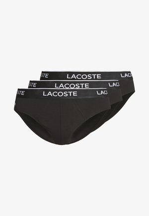 Boxeri negri din bumbac, cu un brâu elastic lat pe care se află logo-ul alb "Lacoste". Textură netedă și design ajustat pentru confort.