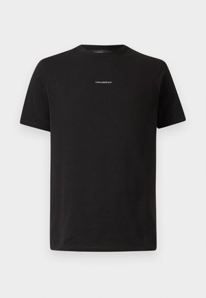 Melnā kokvilnas T-krekls ar apaļu kaklu, īsām piedurknēm un mazu balto "KARL LAGERFELD" logo uz krūtīm. Vienkāršs dizains.