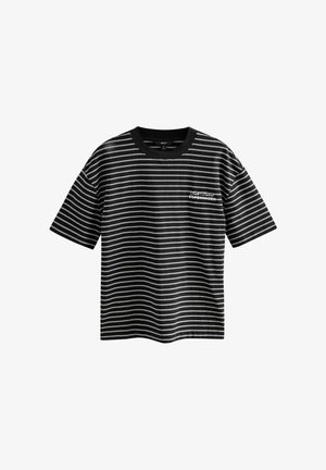 Black and white striped T-shirt with short sleeves and a crew neck. Features "Copenhagen" text design on the front. Made of smooth fabric.