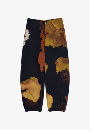 Wide-leg pants with abstract black, brown, orange, and yellow watercolor-like splotches, featuring a loose fit and elasticated cuffs.