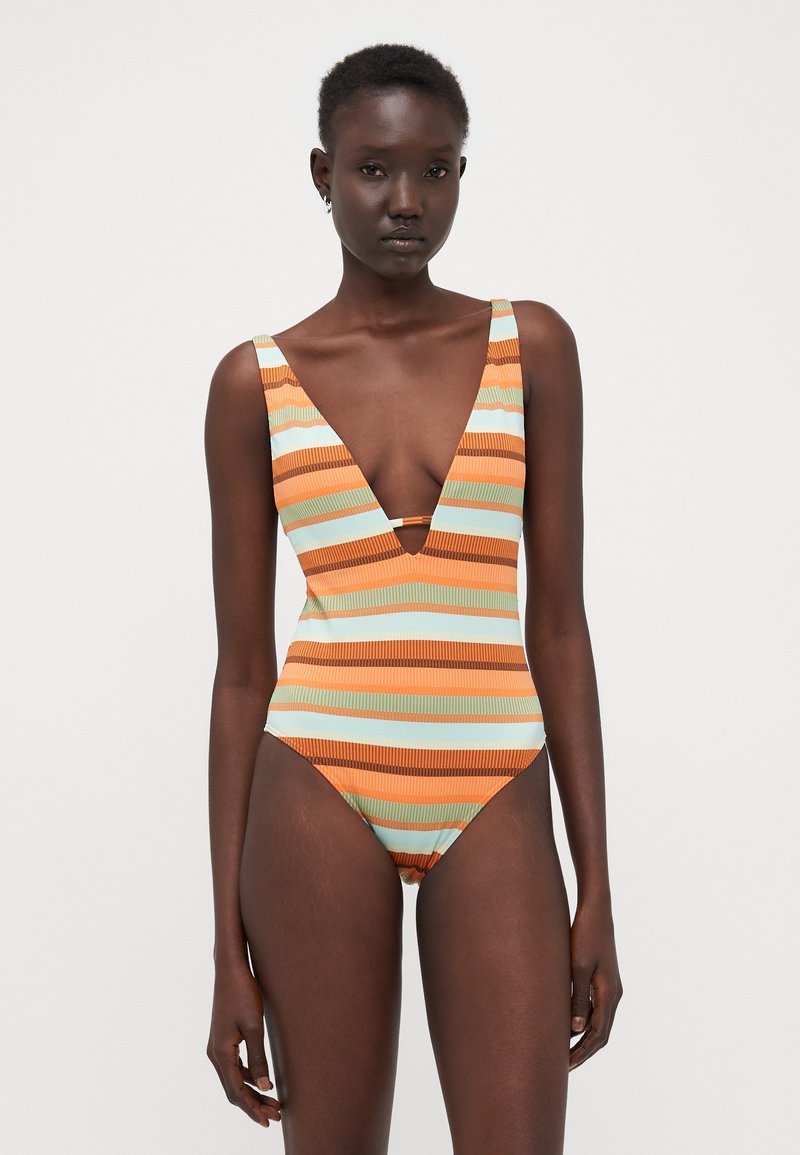 Striped one-piece swimsuit in orange, turquoise, and brown. Designed with a deep V-neck and wide shoulder straps, featuring a ribbed texture.