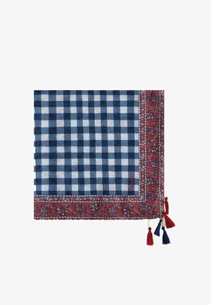 Blau-weiß kariertes Tuch mit rotem Blumenrand und vier roten und blauen Quasten, die von einer Ecke hängen.