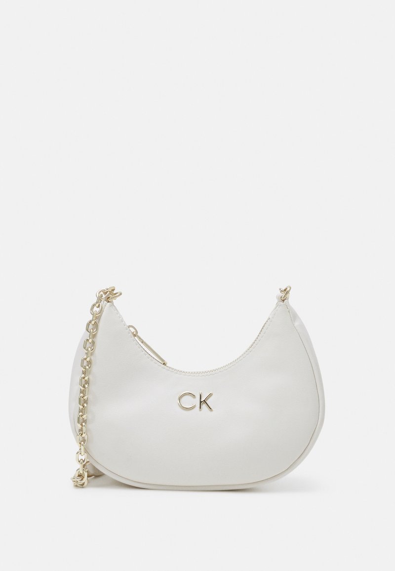 Calvin Klein LOCK SHOULDER BAG Handbag ecru/offwhite Zalando.co.uk