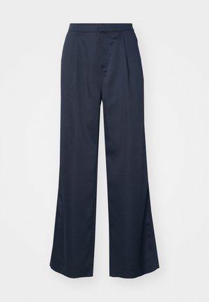 Marineblauwe op maat gemaakte broek met een hoge taille, wijde pijpen en voorklitsen. Gemaakt van een gladde stof met een subtiele glans.