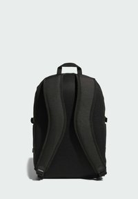 Schwarzer Rucksack mit texturierter Netzrückseite, gepolsterten Schulterriemen und einem oberen Tragegriff. Einfaches, funktionales Design.